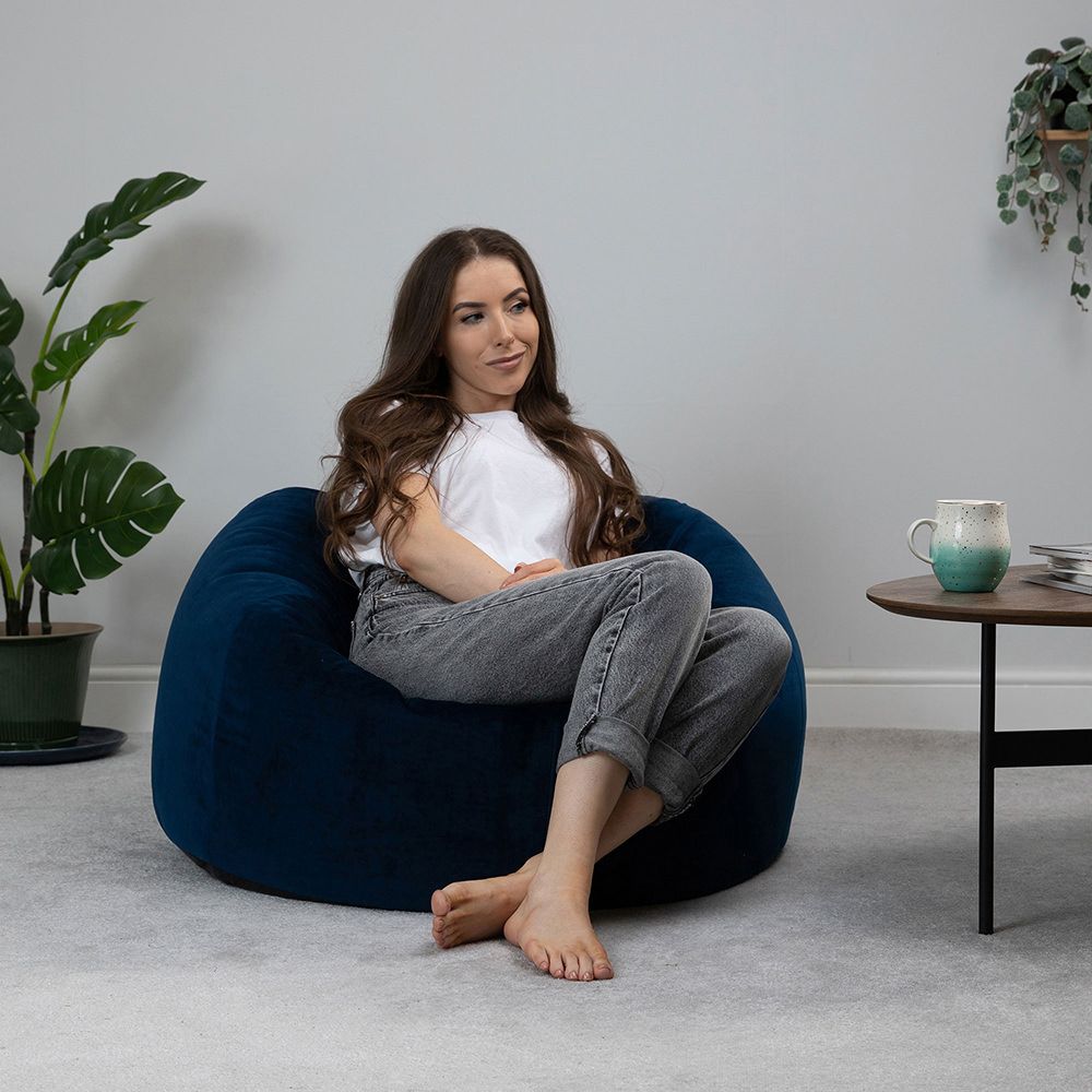 icon® Aurora Velvet Bean Bag in navy with model
