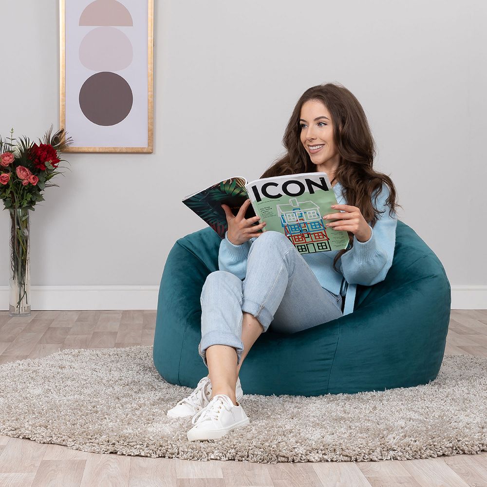 icon® Aurora Velvet Bean Bag in teal with model