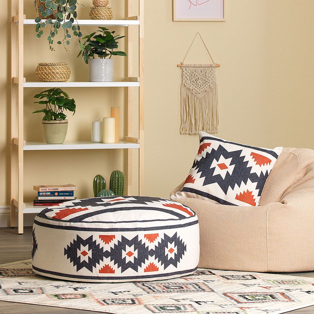 icon® Kyoto Round Indoor/Outdoor Pouffe Footstool, Aztec Print with bean bag in living room