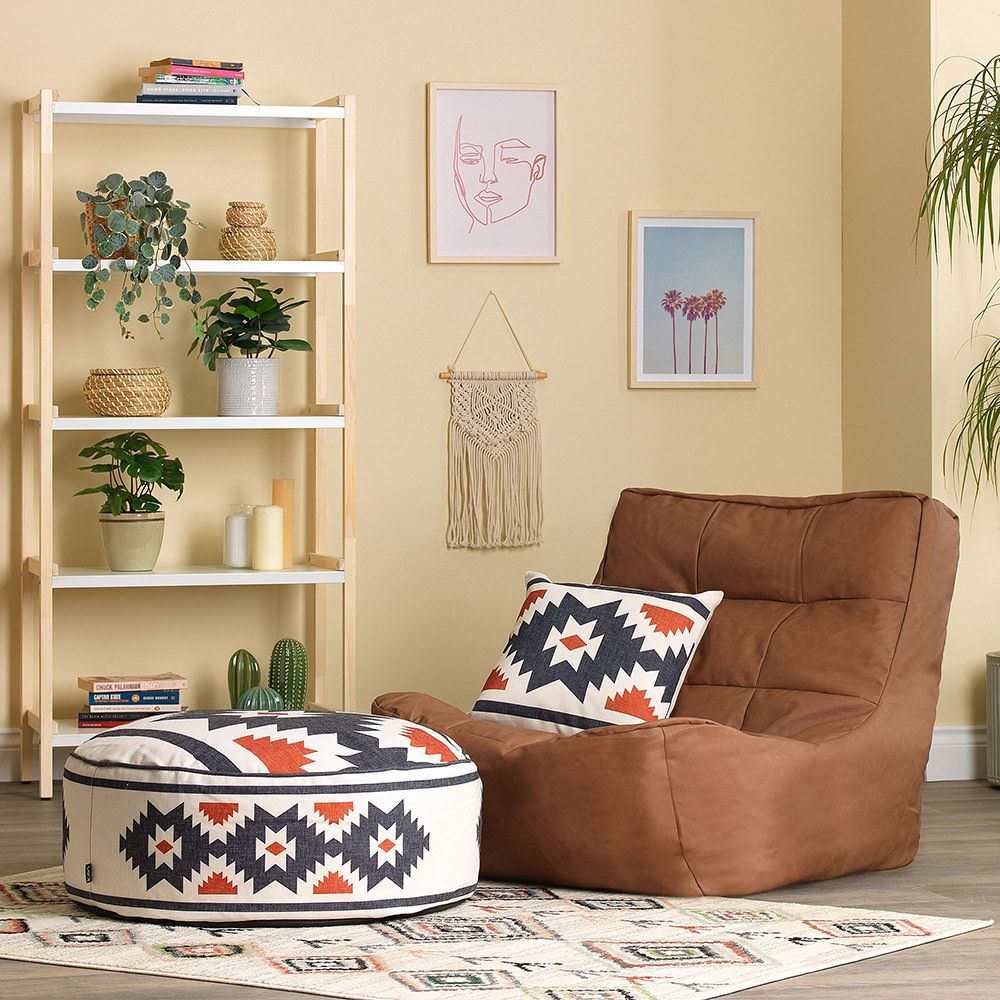 icon® Kyoto Round Indoor/Outdoor Pouffe Footstool, Aztec Print with faux leather bean bag in living room