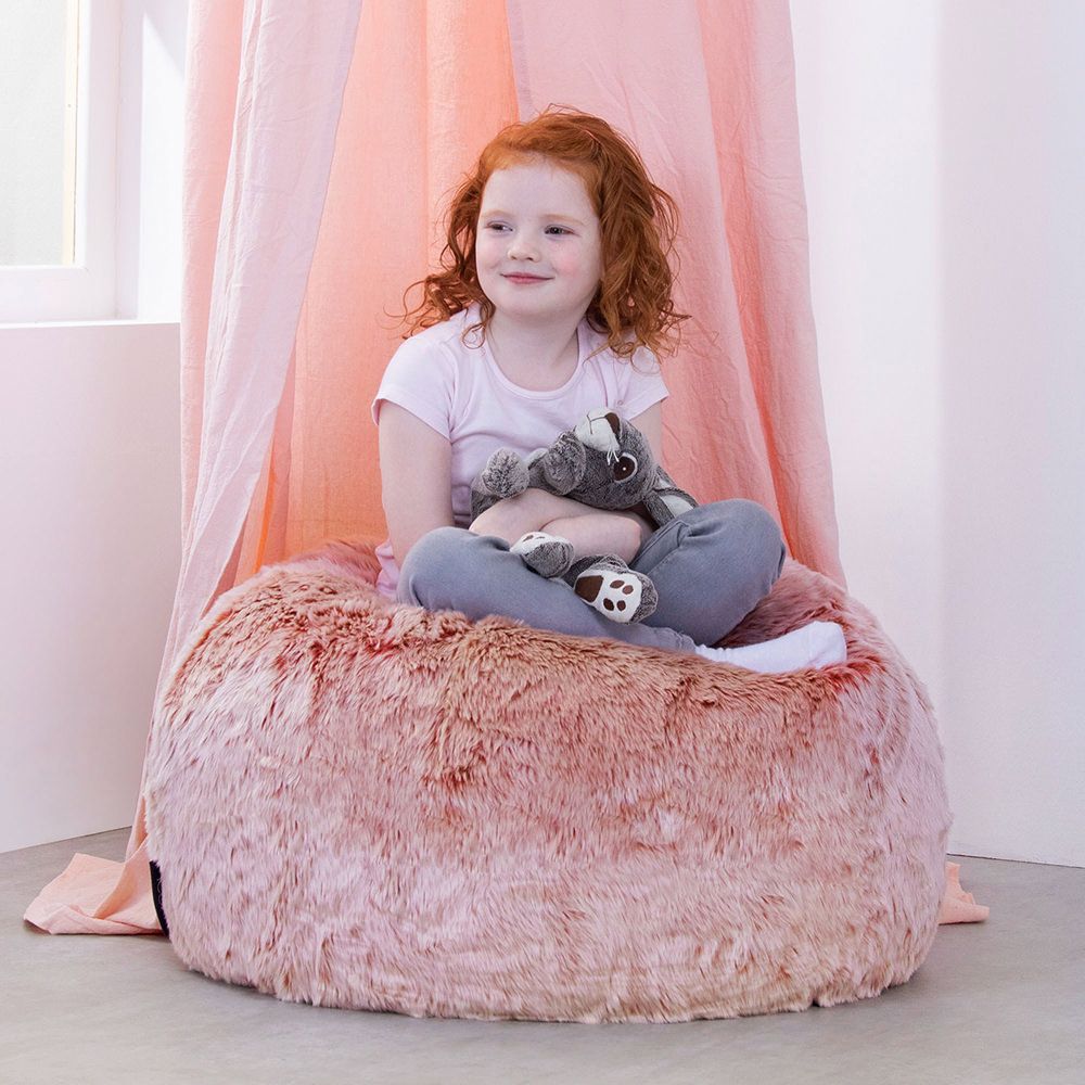 icon® Luxury Faux Fur Kids Classic Bean Bag in pink with model