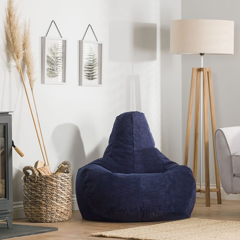 icon® Dalton, Cord High Back Bean Bag Recliner in navy in living room
