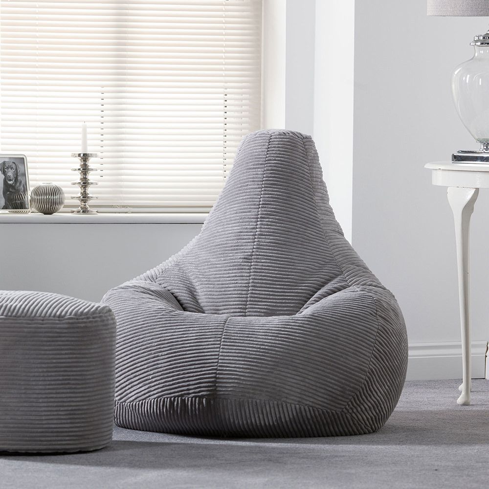 icon® Dalton, Cord High Back Bean Bag Recliner in grey in living room