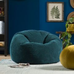icon® Lorenzo Faux Leather Lounger Bean Bag in teal in living room