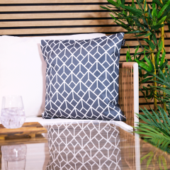 Charcoal grey geometric outdoor cushion lifestyle crop